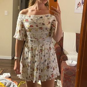 White dress flow off the shoulder